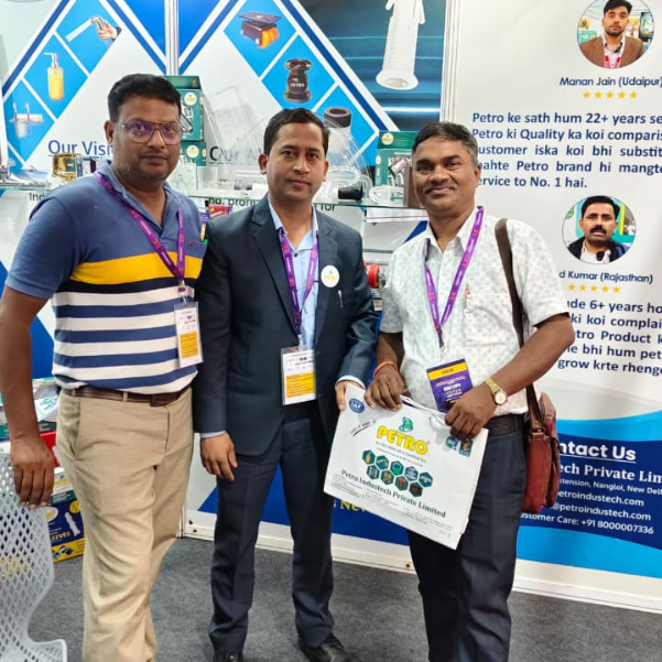 Petro company representatives at industry exhibition displaying hardware and bathroom accessories manufacturing products