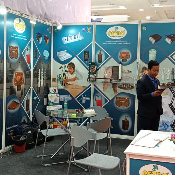 Petro Industech exhibition booth interior displaying bathroom accessories and plastic hardware products