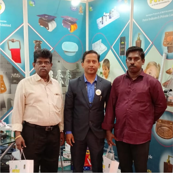 Petro company team interacting with customers at industry exhibition booth in India
